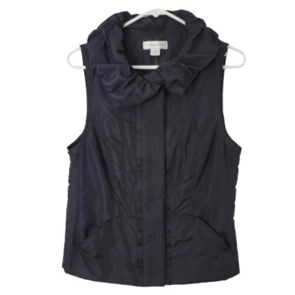 Adorable black vest with ruffled collar.  Size medium.  So cute!  New with tag.